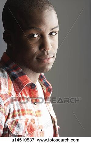 Fashionable Young Man Wearing Casual Clothes In Studio View Large Photo Image Stock Photo - Fashionable Young Man Wearing Casual Clothes In Studio. Fotosearch