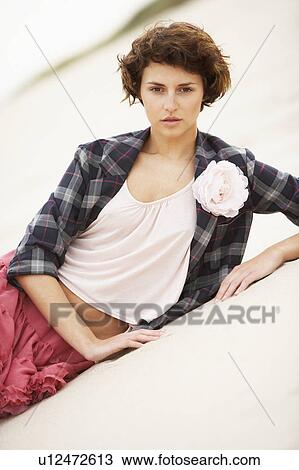 Fashionably Dressed Attractive Young Woman Standing Amongst Sand Dunes View Large Photo Image Stock Image - Fashionably Dressed Attractive Young Woman Standing Amongst Sand Dunes. Fotosearch
