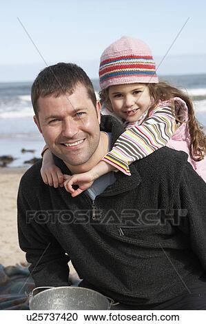 Father And Daughter Having Fun On Beach Together View Large Photo Image Stock Image - Father And Daughter Having Fun On Beach Together. Fotosearch