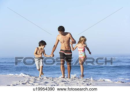 Father Running With Children Along Sandy Beach View Large Photo Image Stock Image - Father Running With Children Along Sandy Beach. Fotosearch