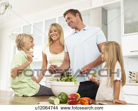 Father & Son Preparing Salad In Modern Kitchen View Large Photo Image Picture - Father & Son Preparing Salad In Modern Kitchen. Fotosearch