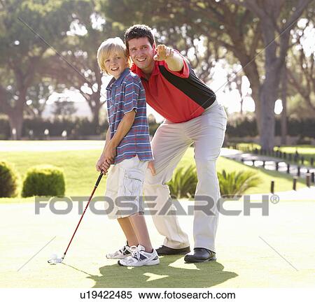 Father Teaching Son To Play Golf On Putting On Green View Large Photo Image Stock Photography - Father Teaching Son To Play Golf On Putting On Green. Fotosearch