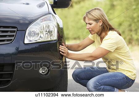 Female Driver Broken Down On Country Road View Large Photo Image Picture - Female Driver Broken Down On Country Road. Fotosearch