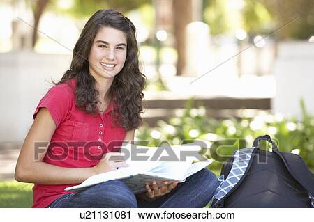 Female Teenage Student Studying In Park View Large Photo Image Stock Image - Female Teenage Student Studying In Park. Fotosearch
