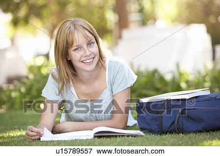 Female Teenage Student Studying In Park View Large Photo Image Stock Photo - Female Teenage Student Studying In Park. Fotosearch