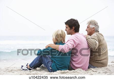 Grandfather, Father And Grandson Sitting On Winter Beach View Large Photo Image Stock Photography - Grandfather, Father And Grandson Sitting On Winter Beach. Fotosearch