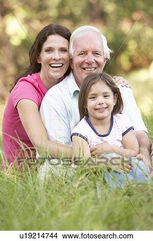 Grandfather With Daughter And Granddaughter In Park View Large Photo Image Picture - Grandfather With Daughter And Granddaughter In Park. Fotosearch