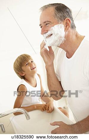 Grandson Watching Grandfather Shaving In Bathroom Mirror View Large Photo Image Stock Image - Grandson Watching Grandfather Shaving In Bathroom Mirror. Fotosearch