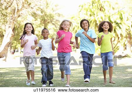 Group Of Children Running Through Park View Large Photo Image Stock Photograph - Group Of Children Running Through Park. Fotosearch