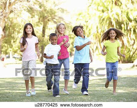 Stock Photography - Group Of Children Running Through Park. Fotosearch