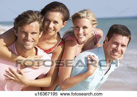 Group Of Friends Enjoying Beach Holiday View Large Photo Image Stock Photography - Group Of Friends Enjoying Beach Holiday. Fotosearch