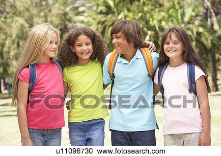 Group Of Schoolchildren Standing In Park View Large Photo Image Stock Image - Group Of Schoolchildren Standing In Park. Fotosearch