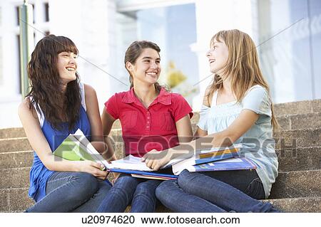 Group Of Teenage Female Friends Sitting On College Steps Outside View Large Photo Image Stock Image - Group Of Teenage Female Friends Sitting On College Steps Outside. Fotosearch