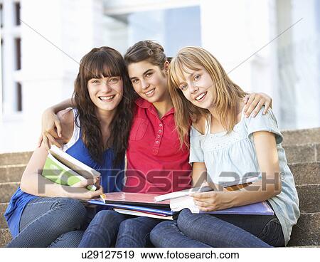 Group Of Teenage Female Friends Sitting On College Steps Outside View Large Photo Image Stock Photo - Group Of Teenage Female Friends Sitting On College Steps Outside. Fotosearch