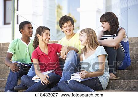 Group Of Teenage Friends Sitting On College Steps Outside View Large Photo Image Stock Photo - Group Of Teenage Friends Sitting On College Steps Outside. Fotosearch