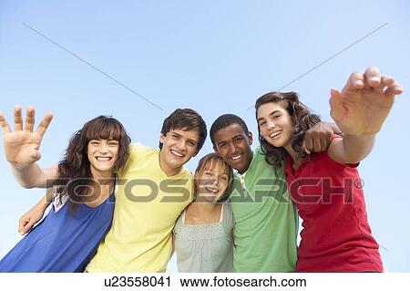 Group Of Teenage Friends Standing Outside View Large Photo Image Stock Image - Group Of Teenage Friends Standing Outside. Fotosearch