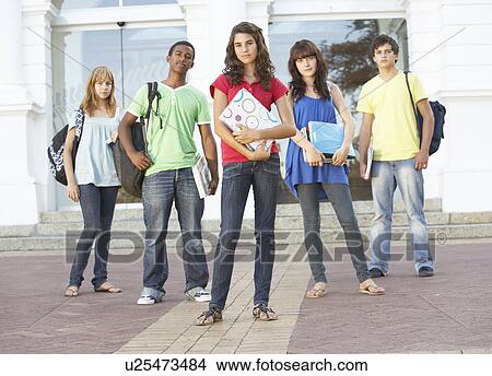 Group Of Teenage Students Standing Outside College Building View Large Photo Image Picture - Group Of Teenage Students Standing Outside College Building. Fotosearch