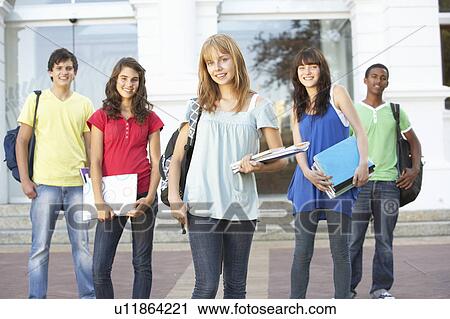 Group Of Teenage Students Standing Outside College Building View Large Photo Image Stock Image - Group Of Teenage Students Standing Outside College Building. Fotosearch