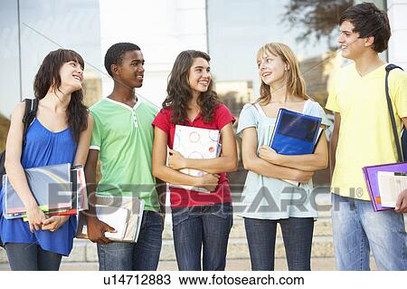 Group Of Teenage Students Standing Outside College Building View Large Photo Image Stock Image - Group Of Teenage Students Standing Outside College Building. Fotosearch