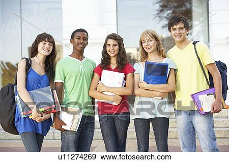 Group Of Teenage Students Standing Outside College Building View Large Photo Image Stock Photo - Group Of Teenage Students Standing Outside College Building. Fotosearch