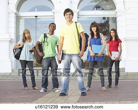 Group Of Teenage Students Standing Outside College Building View Large Photo Image Stock Photo - Group Of Teenage Students Standing Outside College Building. Fotosearch