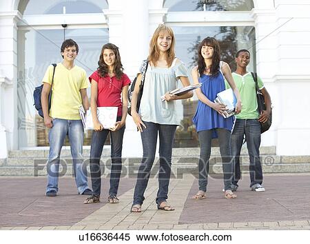 Stock Photography - Group Of Teenage Students Standing Outside College Building. Fotosearch