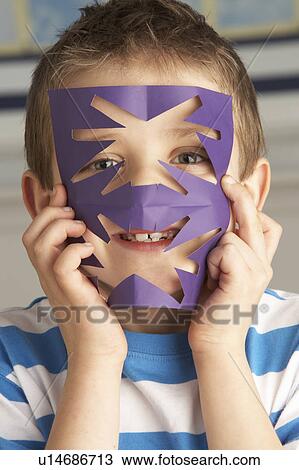 Male Primary School Pupil Cutting Out Paper Shapes In Craft Lesson View Large Photo Image Stock Image - Male Primary School Pupil Cutting Out Paper Shapes In Craft Lesson. Fotosearch