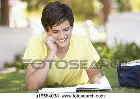 Male Teenage Student Studying In Park View Large Photo Image Stock Photo - Male Teenage Student Studying In Park. Fotosearch