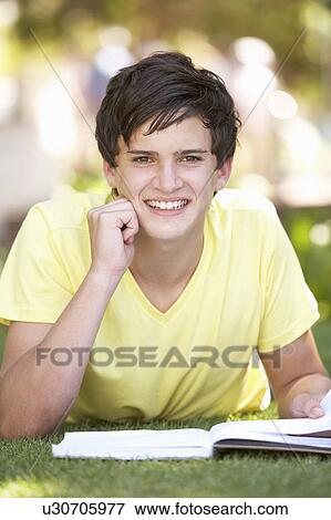 Male Teenage Student Studying In Park View Large Photo Image Stock Photo - Male Teenage Student Studying In Park. Fotosearch