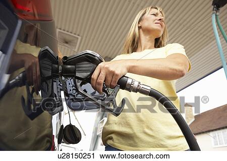 Stock Image - Man At Recycling Centre Recycling Timber. Fotosearch