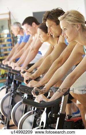 Man Cycling In Spinning Class In Gym View Large Photo Image Stock Photo - Man Cycling In Spinning Class In Gym. Fotosearch