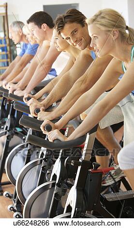Man Cycling In Spinning Class In Gym View Large Photo Image Stock Photograph - Man Cycling In Spinning Class In Gym. Fotosearch