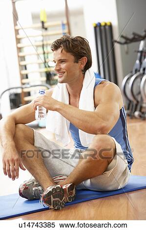 Man Resting After Exercises In Gym View Large Photo Image Stock Photography - Man Resting After Exercises In Gym. Fotosearch