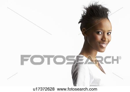 Stock Photo - Portrait Of Attractive Young Woman In Studio. Fotosearch