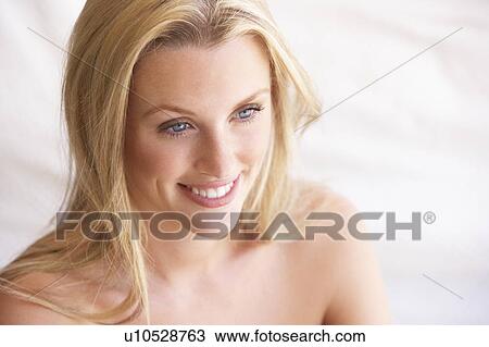 Stock Image - Portrait Of Attractive Young Woman. Fotosearch