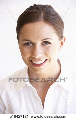 Stock Image - Portrait Of Attractive Young Woman. Fotosearch