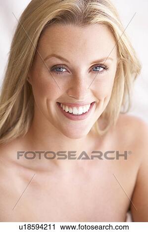 Stock Image - Portrait Of Attractive Young Woman. Fotosearch