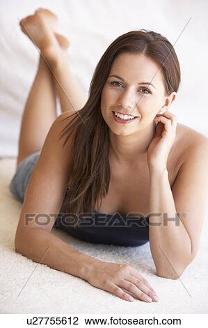 Stock Image - Portrait Of Attractive Young Woman. Fotosearch
