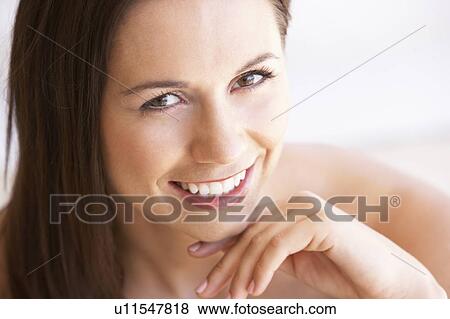 Stock Photo - Portrait Of Attractive Young Woman. Fotosearch