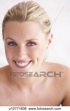 Stock Photo - Portrait Of Attractive Young Woman. Fotosearch