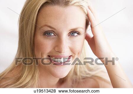 Stock Photo - Portrait Of Attractive Young Woman. Fotosearch
