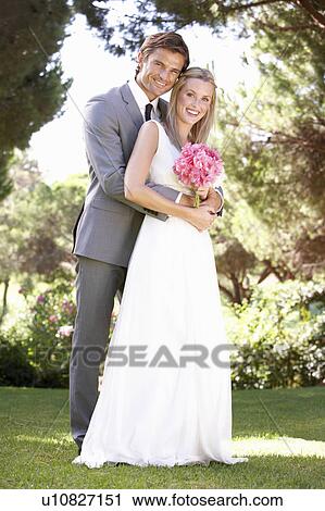 Portrait Of Bridal Couple Outdoors View Large Photo Image Stock Image - Portrait Of Bridal Couple Outdoors. Fotosearch