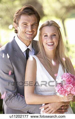Stock Photo - Portrait Of Bridal Couple Outdoors. Fotosearch