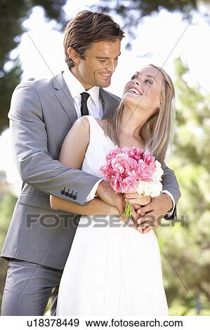 Stock Photo - Portrait Of Bridal Couple Outdoors. Fotosearch