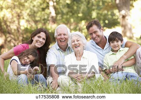 Stock Photo - Portrait Of Extended Family Group In Park. Fotosearch
