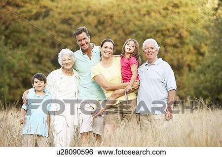 Stock Photograph - Portrait Of Extended Family Group In Park. Fotosearch