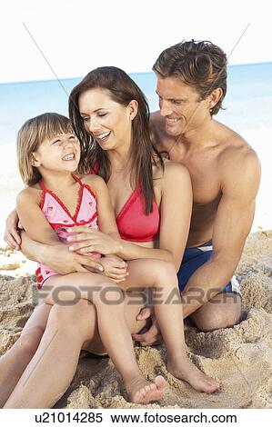 Stock Photography - Portrait Of Family On Summer Beach Holiday. Fotosearch