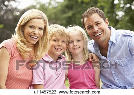 Portrait Of Family Relaxing In Countryside View Large Photo Image Stock Image - Portrait Of Family Relaxing In Countryside. Fotosearch