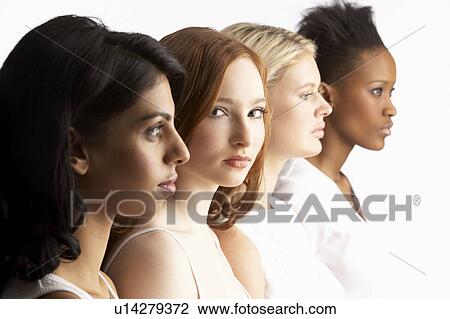 Portrait Of Four Attractive Young Women In Studio Standing In Line View Large Photo Image Stock Image - Portrait Of Four Attractive Young Women In Studio Standing In Line. Fotosearch