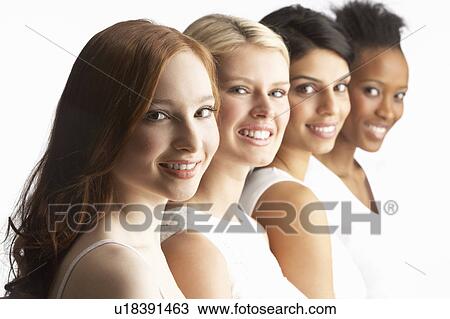 Portrait Of Four Attractive Young Women In Studio Standing In Line View Large Photo Image Stock Image - Portrait Of Four Attractive Young Women In Studio Standing In Line. Fotosearch